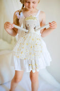 Load image into Gallery viewer, Billie Princess Bunny Doll with Gold Stars Dress being held by a child in a white dress - 43cm
