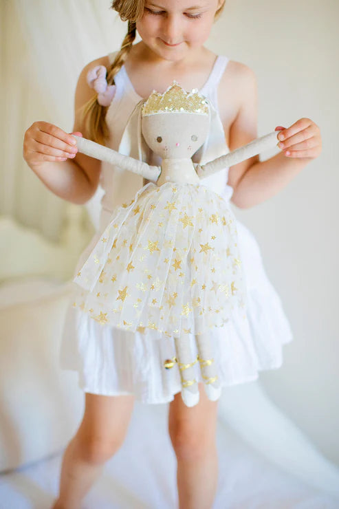 Billie Princess Bunny Doll with Gold Stars Dress being held by a child in a white dress - 43cm